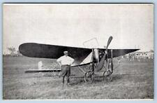 1910's EARLY AVIATION MAN STANDING IN FRONT OF AIRPLANE ANTIQUE POSTCARD picture
