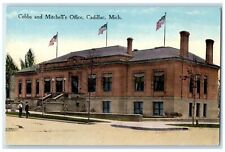 c1910s Cobb's And Mitchell's Office Exterior Cadillac Michigan MI Flags Postcard picture