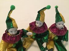THREE PRE-OWNED MARDI GRAS PORCELAIN FACE DOLLS picture