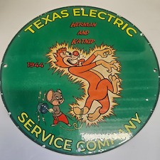 VINTAGE PORCELAIN TEXAS ELECTRIC SERVICE COMPANY HERMAN& KATNIP 1944 SIGN picture