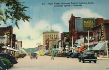 Tejon Street Business District Colorado Springs CO Linen Postcard Old Cars Signs picture