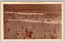 1938 OCEAN CITY NEW JERSEY NJ ENJOYING THE SURF VINTAGE POSTCARD picture