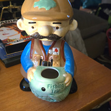 Ceramic Fishing Trip Character Piggy Bank Figurine w/ Coin Slot picture