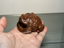 Decorative Pieces of A Four Legged Golden Toad Statue Carved From Tibetan Wood picture