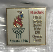White enamel square Kodak 1986 Centennial Atlanta Olympics lapel pin picture