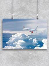 Airplane Flying Above Clouds Poster -Image by Shutterstock picture