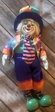 Porcelain Clown with a orange, blue, and purple hat Wind Up picture