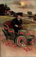 c1909 VICTORIAN BOY DRIVING AUTOMOBILE FLOWERS VALENTINES DAY POSTCARD 39-86 picture