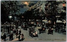 Le Boulevard De La Madeliene Paris France Buildings Cars Streets Night Postcard picture