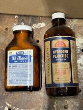 Lot of 2 Vintage Drug Bottles Brown Glass Advertising Labels Hydrogen Rexall picture