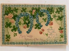 Embossed Postcard Blue Flower Horseshoes 4-Leaf Clovers Many Happy Returns picture