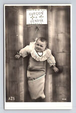 RPPC French Garcon a Vendre Unhappy Boy Baby For Sale Dark Humor Postcard picture