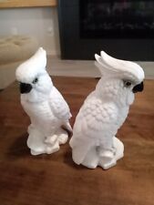 Vintage pair of hand painted porcelain cockatoo statues. picture