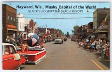 1967 HAYWARD WISCONSIN MUSKY CAPITAL OF THE WORLD*PARADE*DOWNTOWN STREET SCENE picture