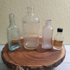 4 Vintage Glass Medicine Bottles Fletchers, Lambert, L. Bros. etc. picture