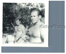 FOUND B&W PHOTO H_4432 TWO BARE CHESTED GUYS AT A PICNIC picture