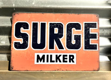 SURGE MILKER DISTRESSED LOOK TIN METAL SIGN 8