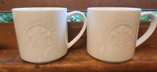 Starbucks Siren Embossed White We Proudly Serve  12 Oz Coffee Mug picture