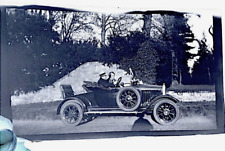 Vintage Celluloid negative photo Old car with driver and passanger woman. picture