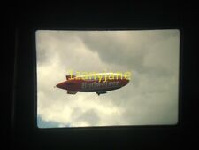 3G16 VINTAGE Photo 35mm Slide RED/WHITE BUDWEISER BLIMP FLYING IN CLOUDY SKIES picture
