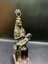 In a perfect scene Isis goddess of magic & motherhood breastfeeding her son picture