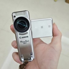 Canon PowerShot TX1 Digital Camera 7.1 MP 10x Optical Zoom Red-Eye Reduction picture