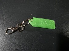 Arctic Cat Jag Green Glow In The Dark Keychain picture