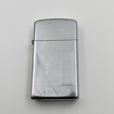 Vintage Zippo 1980 Slim Chrome Lighter All Original Excellent Working Condition picture