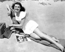 Gene Tierney 1940's era pin-up sunbathing on beach with record player 8x10 photo picture