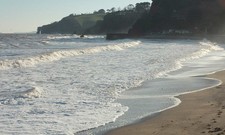 Photo 6x4 Waves at Dawlish Waves break and lap up the beach. On the left  c2018 picture