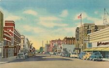 Postcard 1940s Wyoming Cheyenne Seventeenth Street Business autos WY24-1058 picture