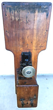 Old Telephone Piece on Wooden Rack brings a touch of old-world charm picture