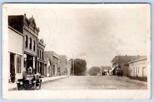1916 RPPC COLO IOWA LINCOLN HIGHWAY STOREFRONTS CAR DIRT ROAD DOWNTOWN HORSES picture