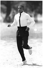 1991 Press Photo CARL LEWIS Santa Barbara Track Club Training Suit Long Jump Tux picture