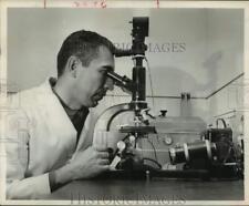 1961 Press Photo Rev. Dr. Albert Moraczewski studies mental disorders in Houston picture