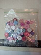 Bag of mixed buttons, all colors, sandwich bag size, mostly two hole picture