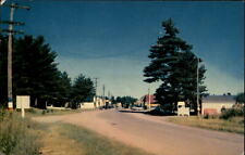 Street to business district Land O'Lakes Wisconsin ~ 1950s cars vintage postcard picture