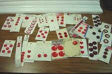 LOT OF RED & BURGUNDY BUTTONS ON CARDS-SOME FULL, SOME PARTIAL picture