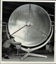 1961 Press Photo R.D. Wilson checks the thermoelectric generator in Pittsburgh picture