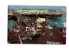 SANTA MONICA, CALIFORNIA Holiday crowd on the Municipal Pier Vintage Postcard picture