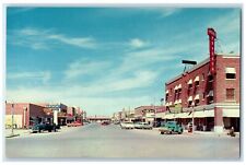 c1960's View Of Oak Street Coffee Shop Hotel Brandon Cars Pecos TX Postcard picture