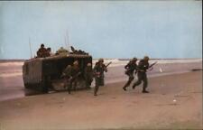 Oceanside,CA Infantry Marines charge from an amphibian tractor on Camp Pendleton picture