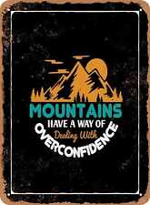 Metal Sign - Mountains Have a Way of Dealing With Overconfidence - Vintage Look picture