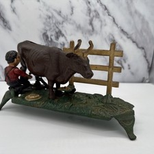 Vintage BOOK OF KNOWLEDGE Farmer Milking Cow Cast Iron Coin Mechanical Bank #29 picture