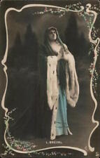 Women A woman standing in the praying position. Postcard Vintage Post Card picture