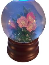 Vintage Snow Globe Music Box With Pink Flowers On A Wooden Stand picture