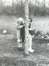 A8 Photograph Girls Trying To Hide Behind Tree 1950's picture
