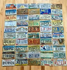 50 Roadkill Condition License Plates from at least 30 Different States picture