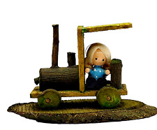 Enesco Farmer Girl with Pigtails Sitting on Wood Tractor Figurine Vintage 1978 picture