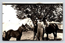RPPC Man Farmer Rancher with Several Horses Big & Small Real Photo Postcard picture